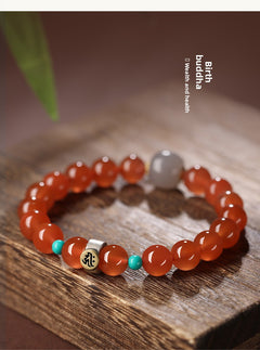 Collectible-grade Hetian jade bracelet with high-ice red agate centerpiece and turquoise accents — Crimson Serenity Hetian Jade Bracelet.