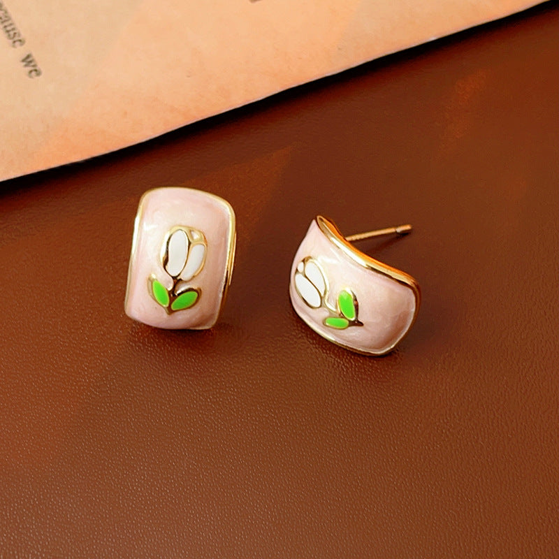Blush-pink enamel rectangular studs with tulip motif and gold rim — Blush Tulip Cameo Studs.