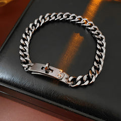 LockChain Minimalist Bracelet in silver, gold, and black metal chain with lock clasp design, displayed on wrist