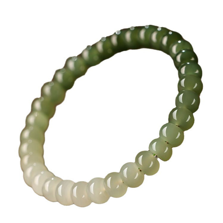 Gradient Hetian (nephrite) jade bracelet hand-strung with 8 mm polished round beads — Serene Gradient Hetian Jade Bead Bracelet.