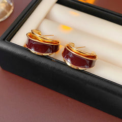 Gloss enamel crescent hoop earrings in red and white with metallic trim — Gloss Enamel Crescent Hoops.