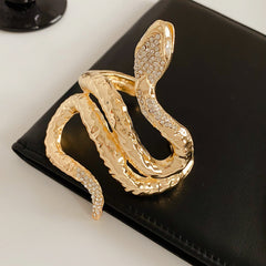 Serpent Luxe Cuff bracelet in gold and silver with rhinestone snake design