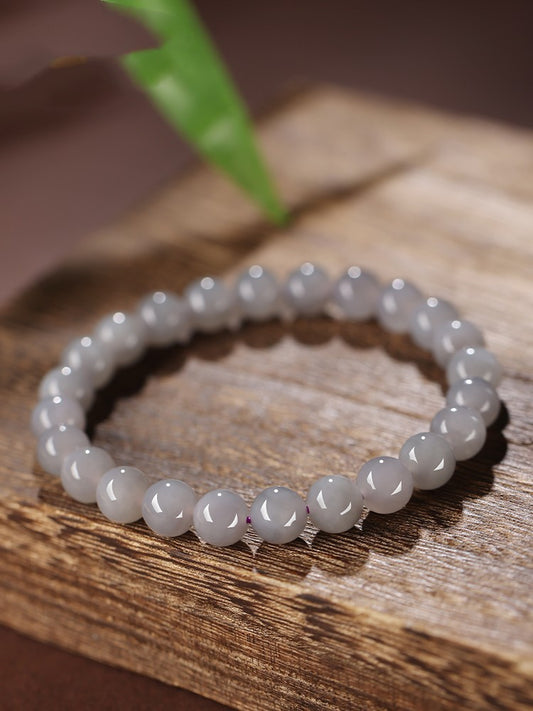 Three Hetian (nephrite) jade bracelets in gradient tones of Yan Purple, Qiemu Yellow, and Lotus Pink — Trinity Harmony Hetian Jade Bead Bracelets.