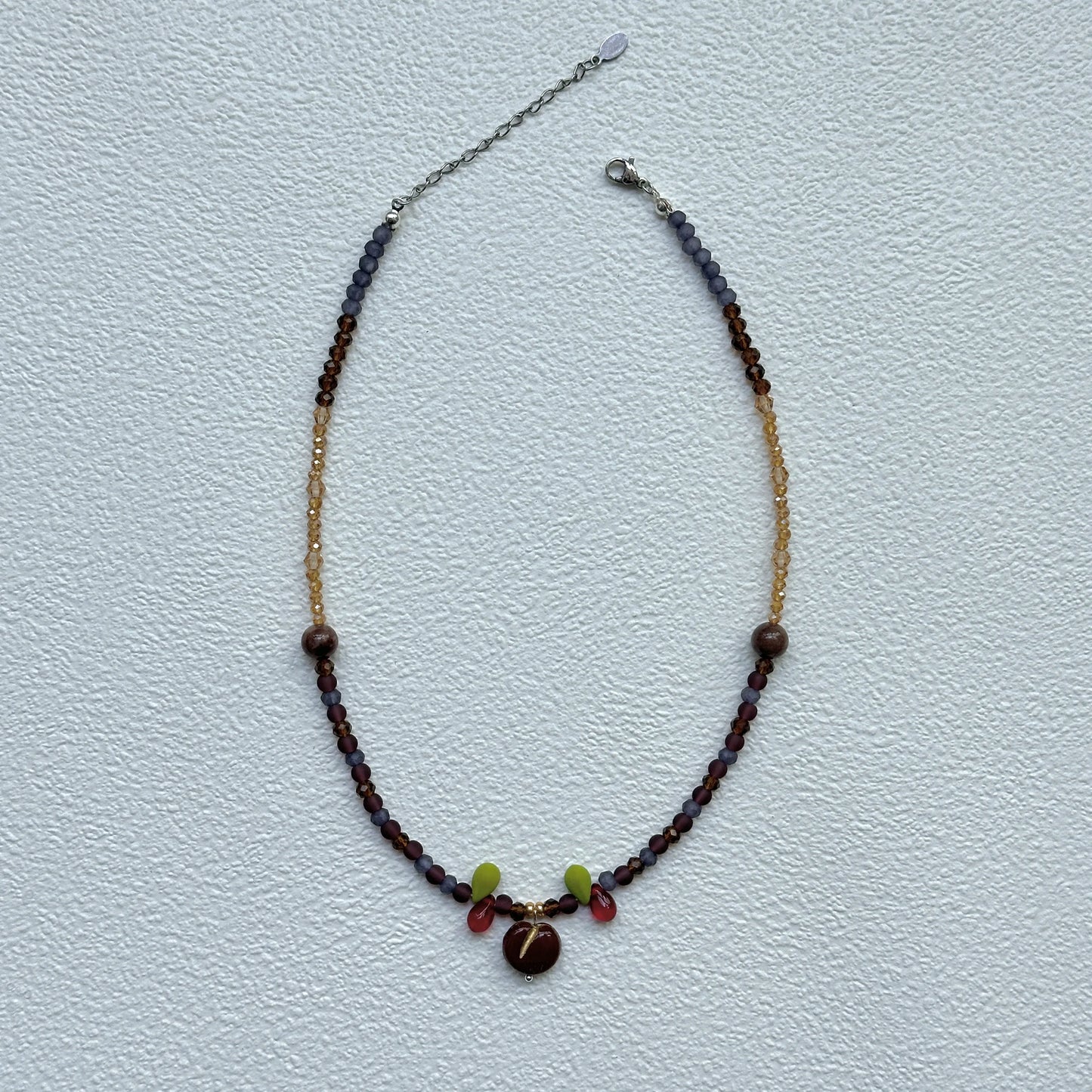 Purple, bronze and gold seed bead strand with orchard detail, handmade