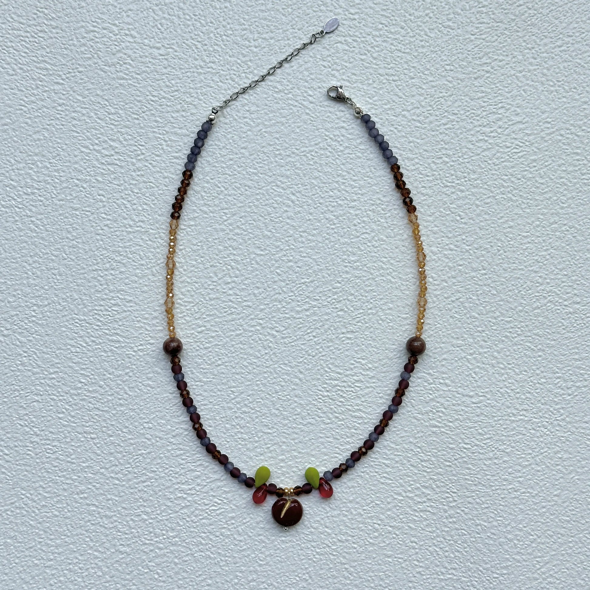 Purple, bronze and gold seed bead strand with orchard detail, handmade