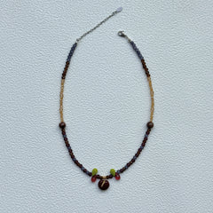Purple, bronze and gold seed bead strand with orchard detail, handmade