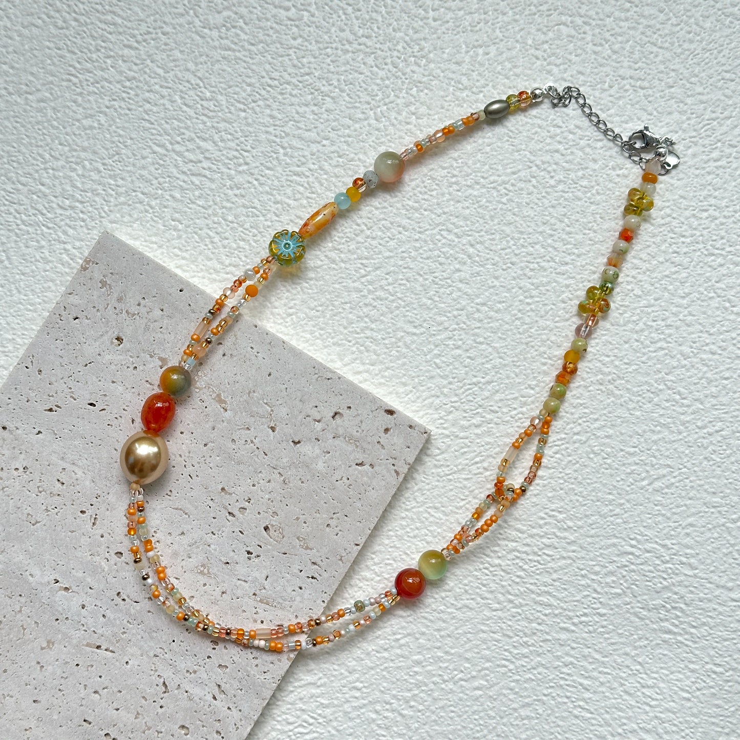 Golden Ember Necklace handcrafted beadwork in golden and red hues