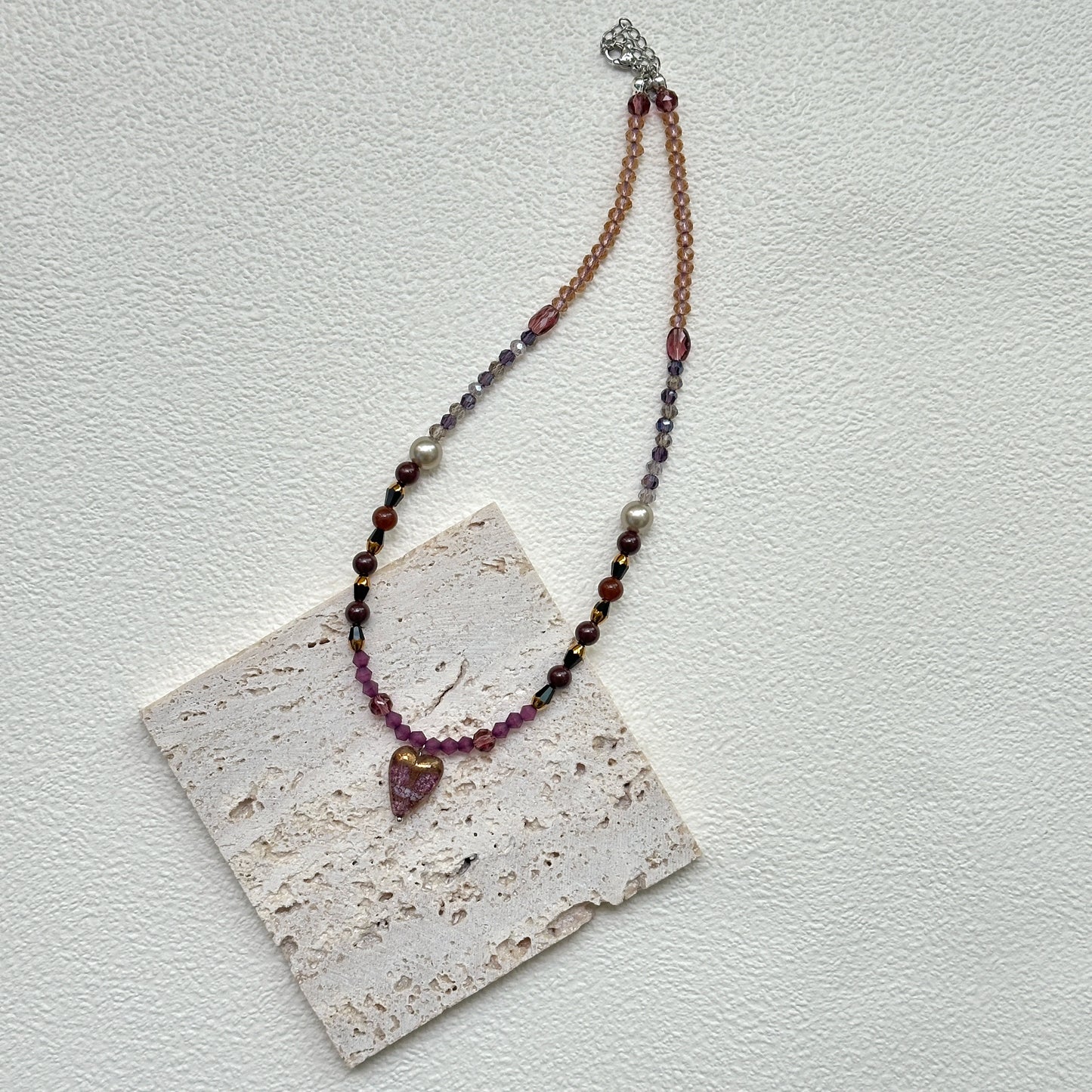 Amour Heart Necklace styled on white background card – handmade blush glass heart pendant necklace with burgundy and gold beads by Glazenya