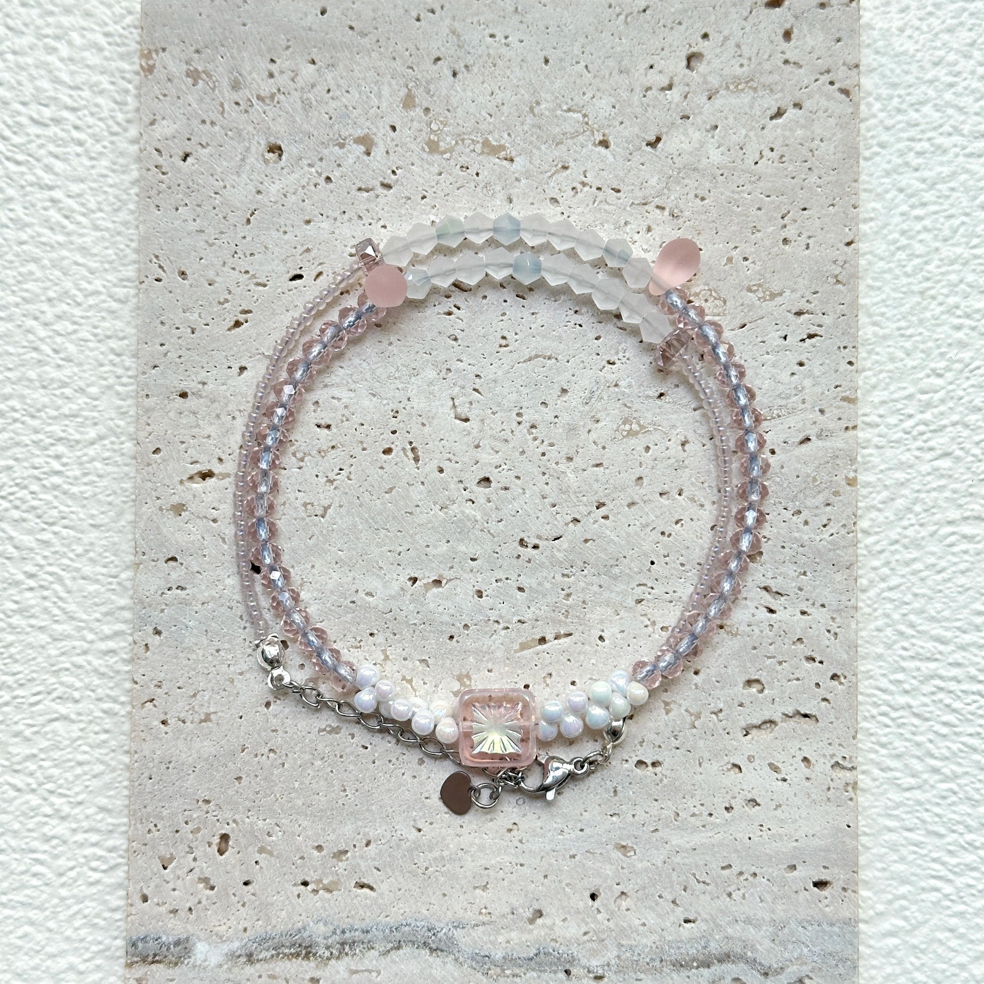 Blush Crystal Necklace circular arrangement – soft pink and clear beads with elegant square-cut crystal centerpiece by Glazenya