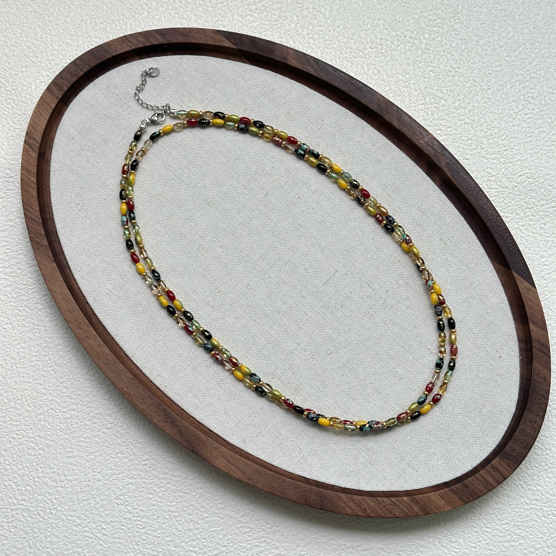 Tribal Glow Necklace oval arrangement – colorful double-strand glass beaded necklace handcrafted by Glazenya