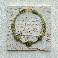 Minimalist gold-tone and green glass bead necklace
