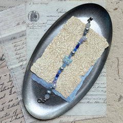 Lightweight handcrafted butterfly bracelet in azure tones