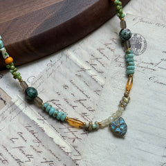 Collar de búho verde 