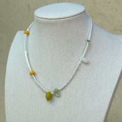 Model wearing Lemon Drop Charm Necklace, fresh everyday style