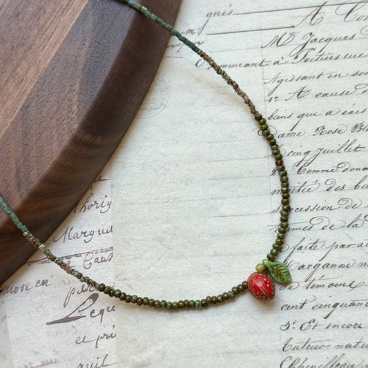 Handmade necklace with strawberry glass charm and green bead strand with leaf accent – Glazenya