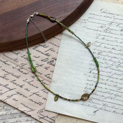 Handmade Verdant Leaf Necklace featuring leaf-shaped charms, natural stones, and Czech beads – Glazenya artisan necklace

