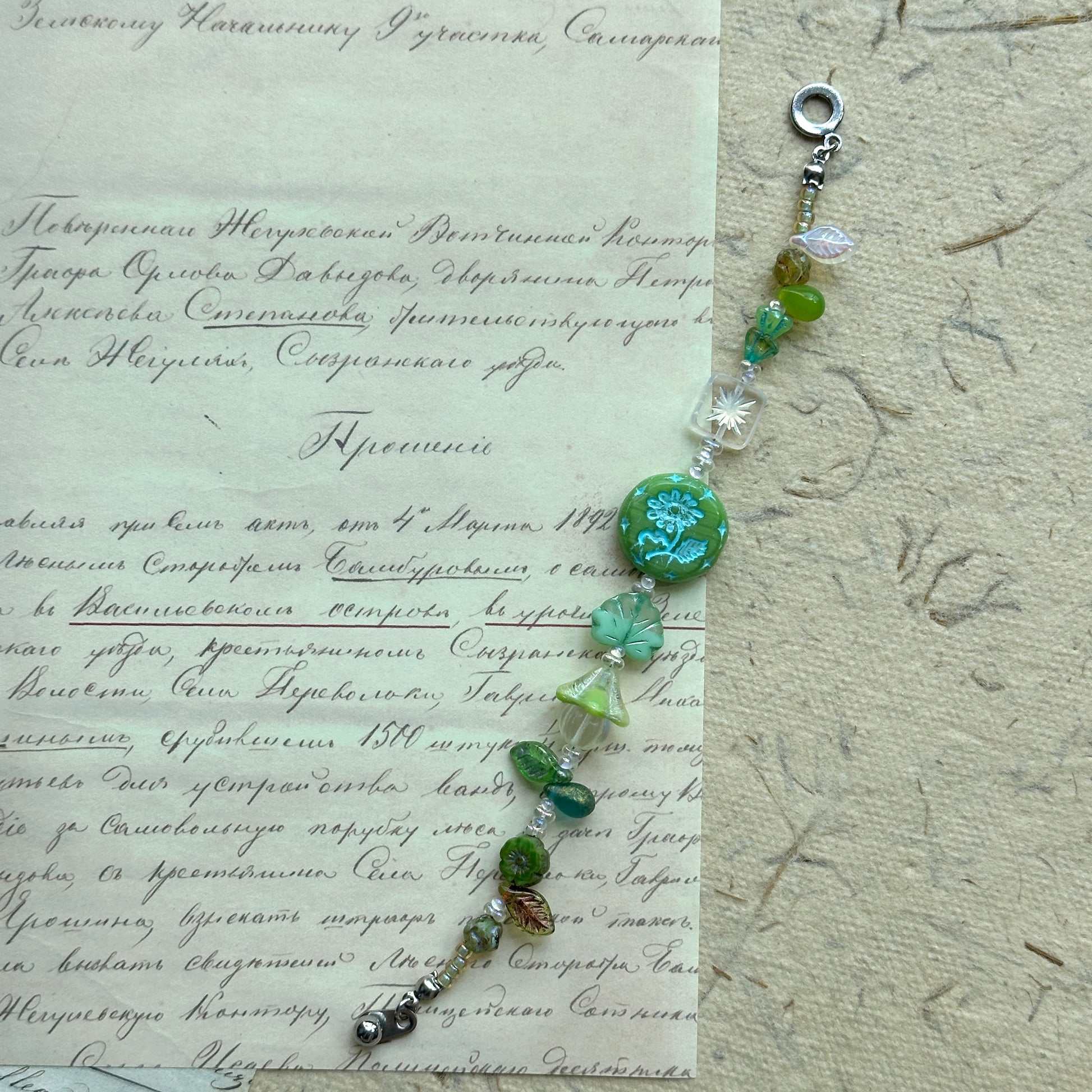 Nature-inspired bracelet in woodland greens and crystal whites