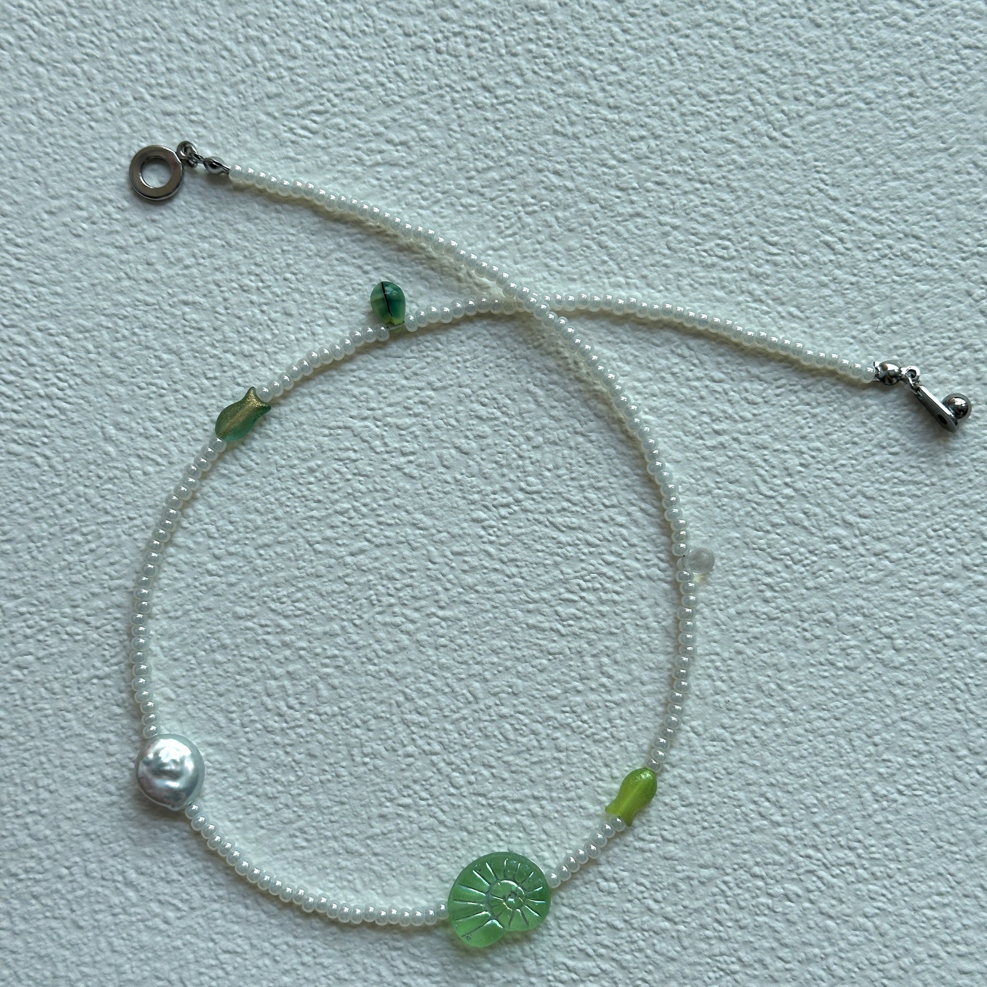 Silver pearl-like bead detail in Lily Pond Necklace