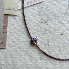 Rustic Butterfly Necklace with turquoise butterfly bead on display bust