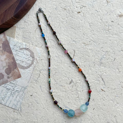 Bohemian handcrafted necklace with vibrant stone-like details