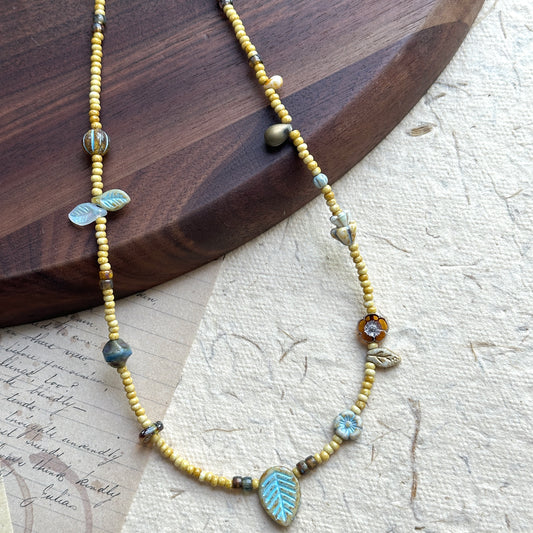 Meadow Leaf Necklace with turquoise leaf pendant and golden beads