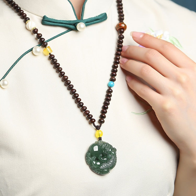 Hetian (nephrite) green jade medallion pendant close-up – Wishkeeper, 35×35×14 mm