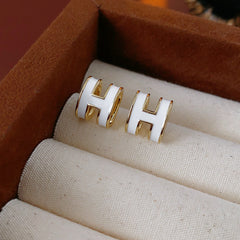 White enamel H letter earrings with gold trim, minimalist chic jewelry