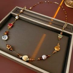 Glazenya Retro Ethnic Geometric Ceramic Long Necklace — handcrafted brown ceramic sweater chain with high-end autumn winter ethnic style design.