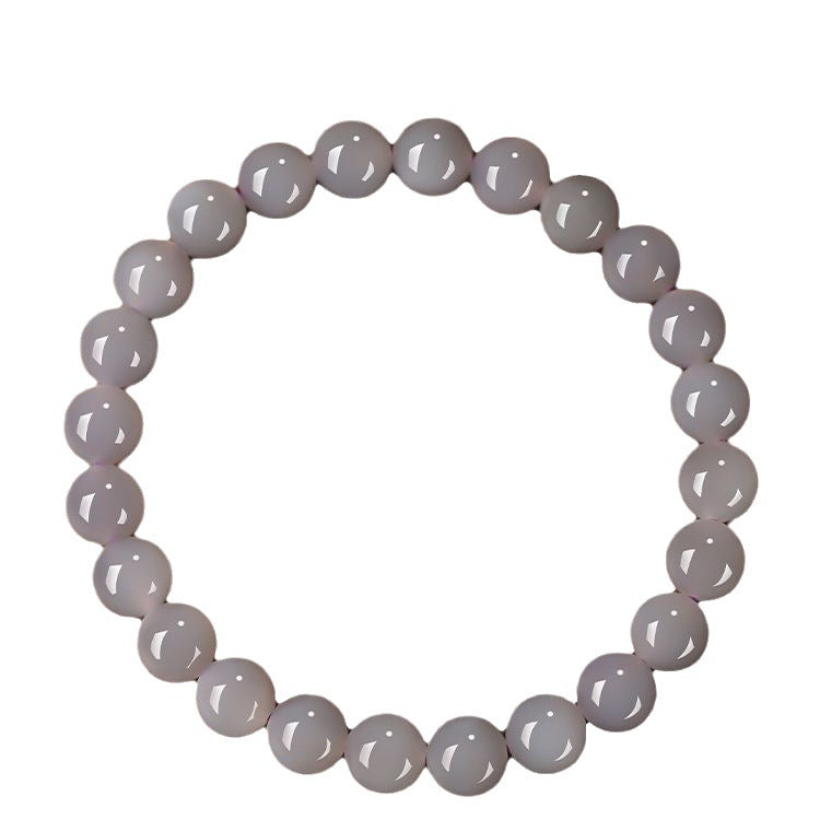 Three Hetian (nephrite) jade bracelets in gradient tones of Yan Purple, Qiemu Yellow, and Lotus Pink — Trinity Harmony Hetian Jade Bead Bracelets.