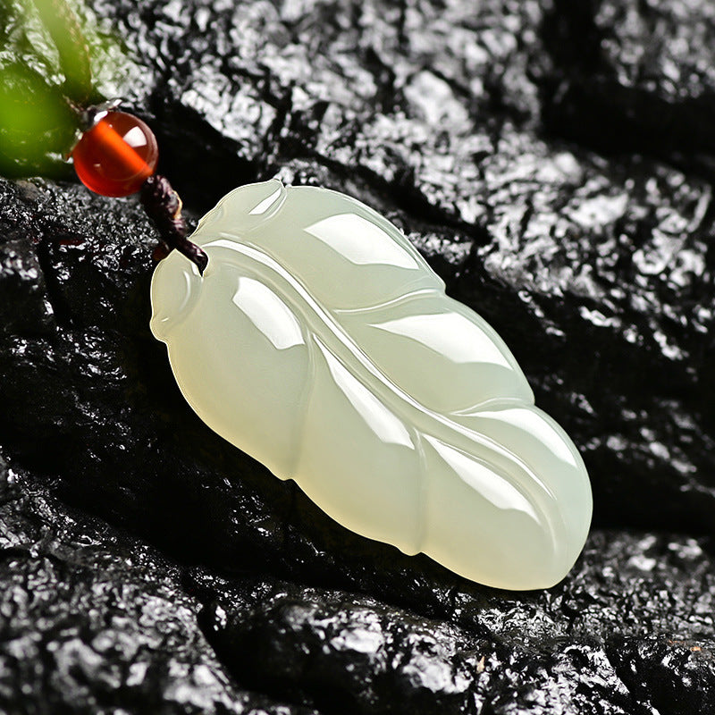 Hetian (nephrite) white jade leaf pendant close-up – Golden Bough, 38×21×8 mm