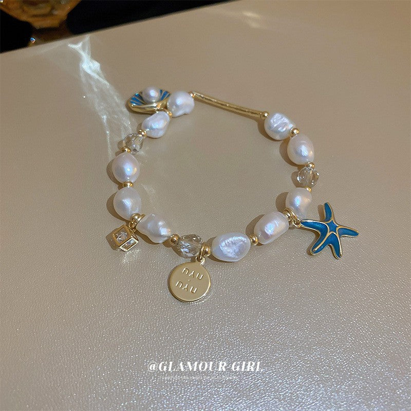 Stellar Moonlight Crystal Bracelet with star and moon charm – clear crystal beads