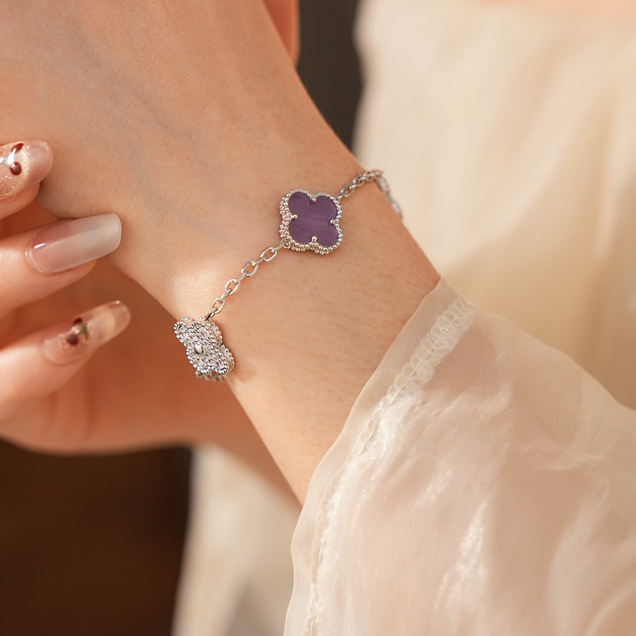 Violet Fleur Elegance Bracelet with violet clover motifs and golden beaded frames on chain