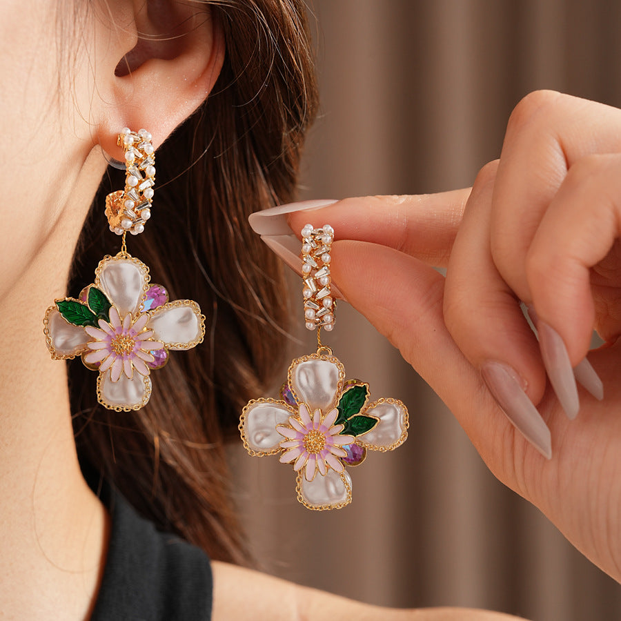 Romantic floral statement earrings with pink blossoms, imitation pearls, and enamel petals — Blossom Pearl Garden Earrings.