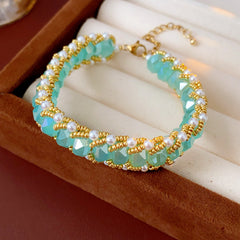 Braided glass-pearl and crystal bracelet with gold extender chain in Coffee Amber/Violet/Jade Green — Braided Pearl Crystal Bracelet.