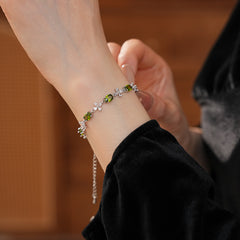 Iridescent Charm Bracelet in vivid multicolor zircon stones on silver-tone copper chain, elegant and lightweight luxury jewelry.
