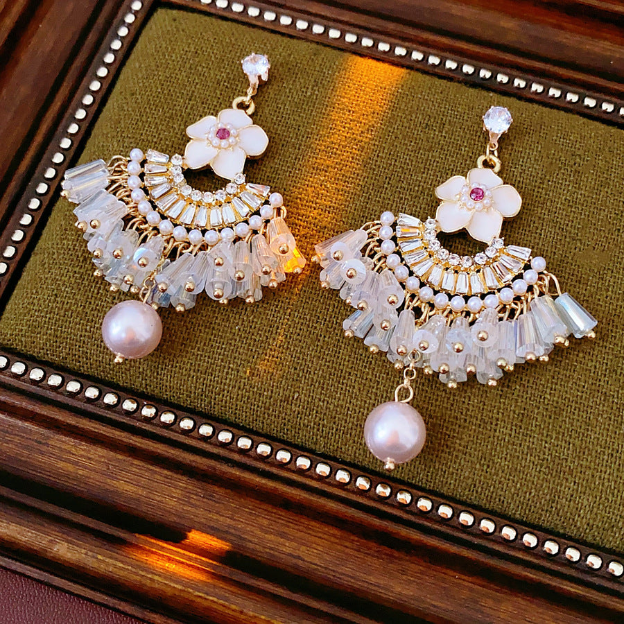 Floral fan chandelier earrings with layered crystal fringe and pearl drops — Blossom Fan Pearl Fringe Earrings.