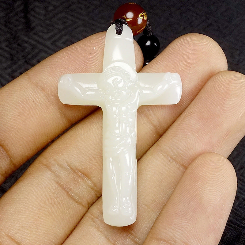 Hetian (nephrite) white jade crucifix pendant close-up – Sacred Light, 48×29×9 mm