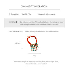 Statement necklace with articulated fishbone fringe, gold beads, and red or black chip strands — Kaleido Fishbone Fringe Necklace.