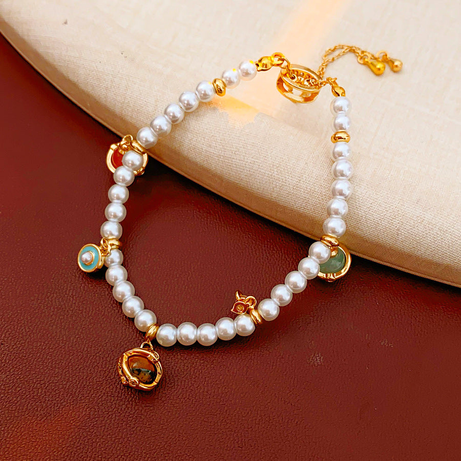 Fleur de Pearl Luxe Set with pearl necklace and matching zircon-accented bracelet, elegant and romantic