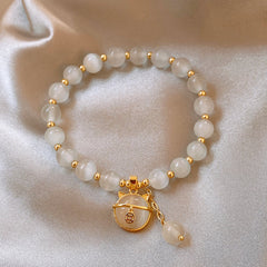 Multi-style cat’s eye and pearl bracelet collection – chic women’s accessories