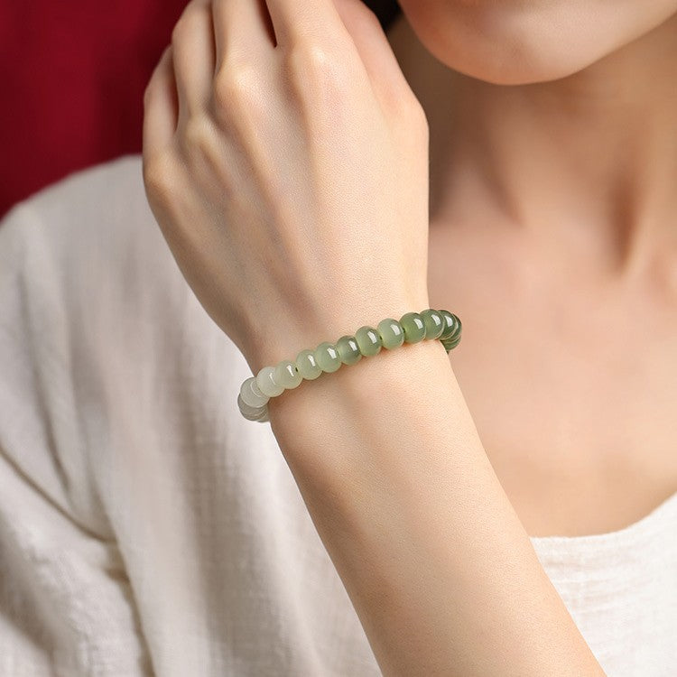 Gradient Hetian (nephrite) jade bracelet hand-strung with 8 mm polished round beads — Serene Gradient Hetian Jade Bead Bracelet.