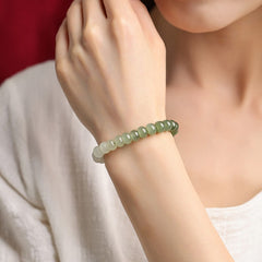 Gradient Hetian (nephrite) jade bracelet hand-strung with 8 mm polished round beads — Serene Gradient Hetian Jade Bead Bracelet.