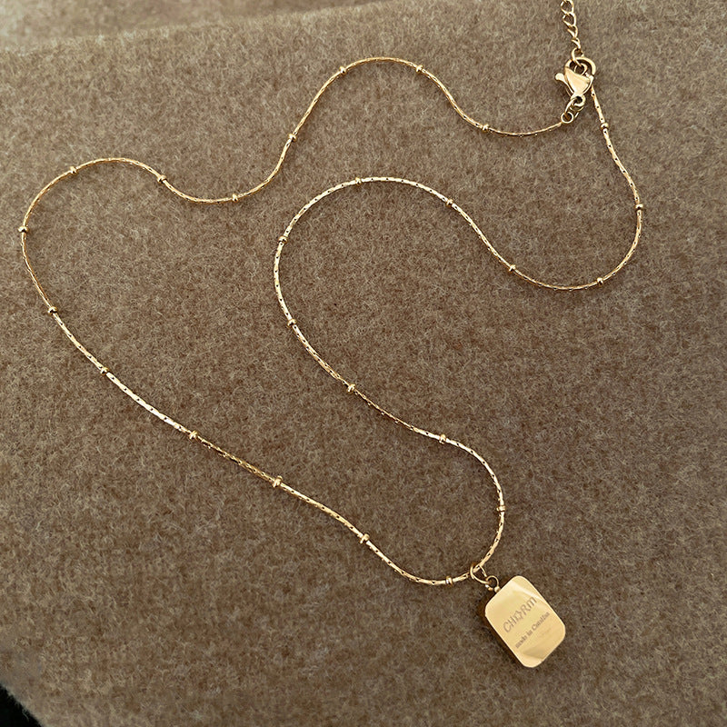 Eternal Moon Heart Necklace in gold plated finish – elegant romantic pendant on lock-bone chain