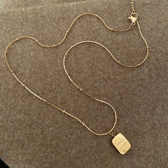 Eternal Moon Heart Necklace in gold plated finish – elegant romantic pendant on lock-bone chain
