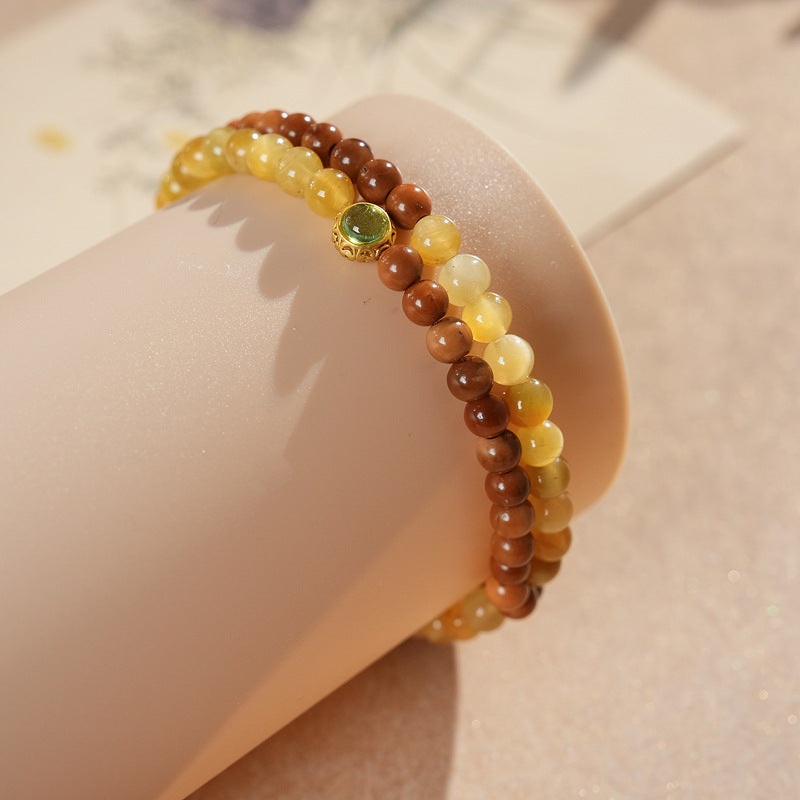 Double-strand yellow and brown beaded wrap bracelet with a small green bezel accent — Golden Harvest Wrap Bracelet Set by Glazenya.