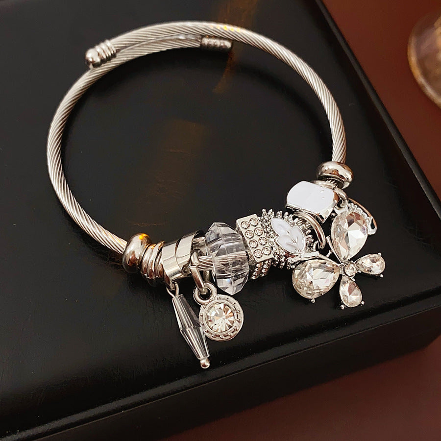 Glimmerwing Luxe Charm Bangle with butterfly and crystal charms – Glazenya jewelry