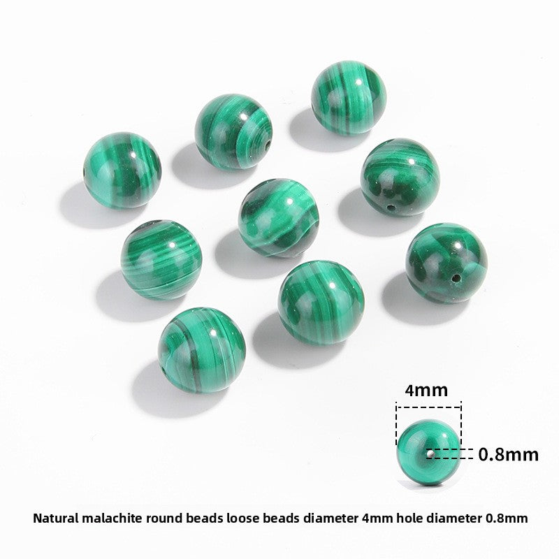 Malachite round beads with green banded “peacock” patterns, polished, assorted 4–12 mm — Peacock Veins.