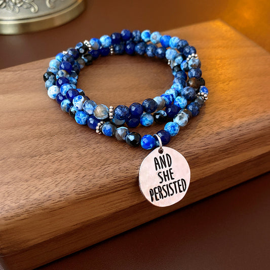 Multi-wrap blue agate bracelet with “AND SHE PERSISTED” charm — Ocean Resolve Bracelet by Glazenya.