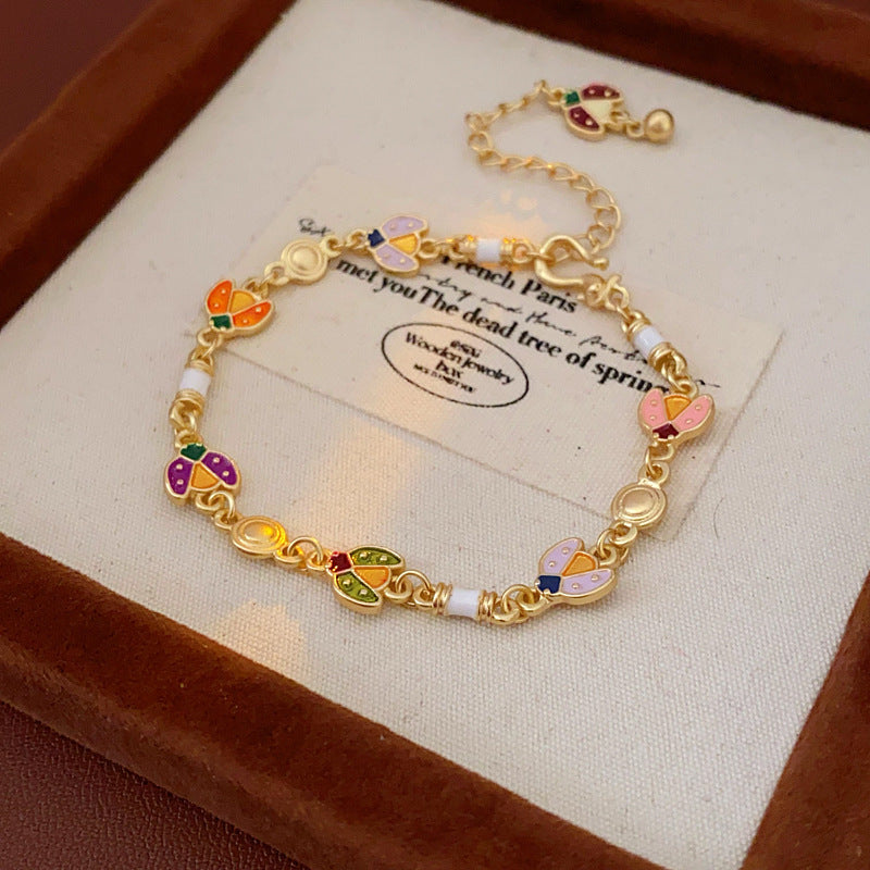 Product size chart for Vintage Enamel Floral Bracelet in golden alloy with enamel flowers