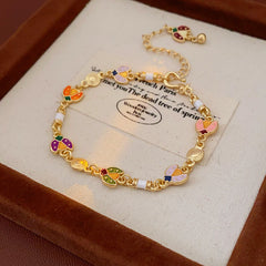 Product size chart for Vintage Enamel Floral Bracelet in golden alloy with enamel flowers